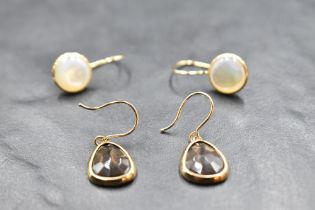 Two pairs of loop drop earrings having moonstone and smoky quartz drops, approx 4.4g gross