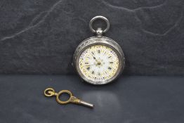A lady's continental silver key wound pocket watch having Roman numeral dial to highly decorative