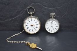 A small Victorian silver key wound pocket watch having Roman numeral dial to decorative face in an