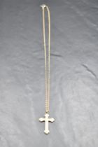 A 9ct rose gold cross pendant on a yellow metal chain with replacement claps, approx 16' & 2.4g