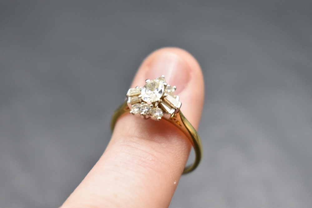 A lady's dress ring having a diamond cluster with central oval diamond surrounded by baguette and - Image 2 of 2