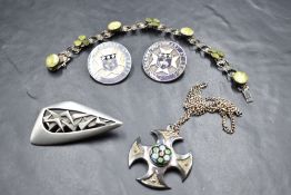 A small selection of silver and white metal jewellery including two Leeds hospital nursing brooches,