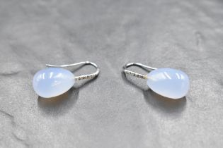 A pair of 18ct white gold loop drop earrings having diamond decoration to pale blue opalescent