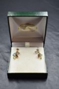 A pair of 9ct gold earrings having multi non precious coloured stone drops