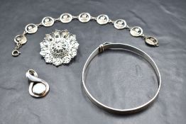 A small selection of silver and white metal jewellery including Ortak silver bracelet having nine