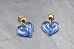 A pair of Lalique blue glass heart shaped earrings with yellow metal fittings, bearing signature