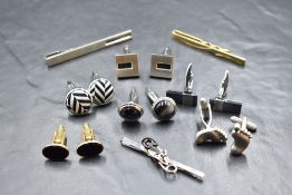 A gents tie slide by Vivienne Westwood having Orb and safety pin detail, and a selection of