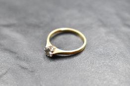 A diamond solitaire ring, having a brilliant cut diamond, approx 0.4ct in a raised claw set mount on