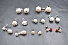 Several pairs of baroque pearl earrings for pierced ears of various designs