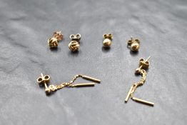 Three pairs of 9ct gold earrings for pierced ears including knot and chain drops, total approx 2g