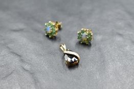 A pair of 9ct gold opal and green stone flower head cluster earrings, marked .375,2.4grams gross,