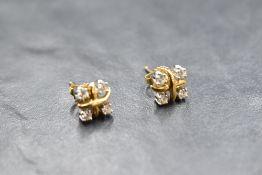 A pair of Tiffany & Co Lynn 18ct gold and platinum earrings designed by Jean Schlumberger having