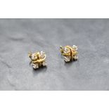 A pair of Tiffany & Co Lynn 18ct gold and platinum earrings designed by Jean Schlumberger having