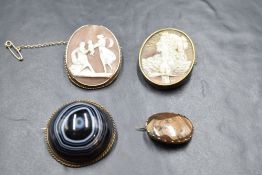 A late 19th/early 20th century banded agate brooch, of hemispherical form with gilt metal