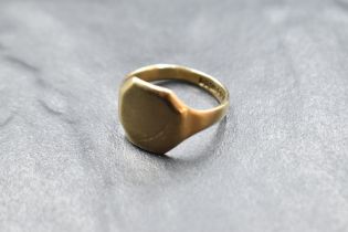 A 9ct gold signet ring having a worn decorative engraved panel, size N & approx 4.4g