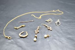 A small selection of 9ct gold and yellow metal jewellery including pearl earrings, odd earrings,