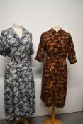 A 1940s floppy cotton day dress, having abstract rose pattern on grey ground, buttons to front,