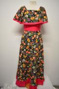 A bright and cheerful 1960s cotton maxi dress, with shawl collar and back metal zip