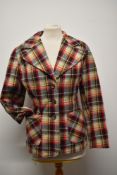 A mid century vintage checked jacket, having notched collar and pockets to front.
