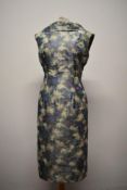 A 1960s silk cocktail dress, having abstract print in blue, purple, green, white and grey, cowl