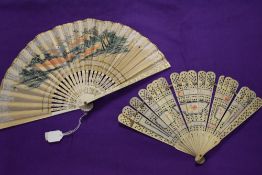 A 19th century fan, having carved bone ribs and a1930s fan with hand painted boat and house scene,