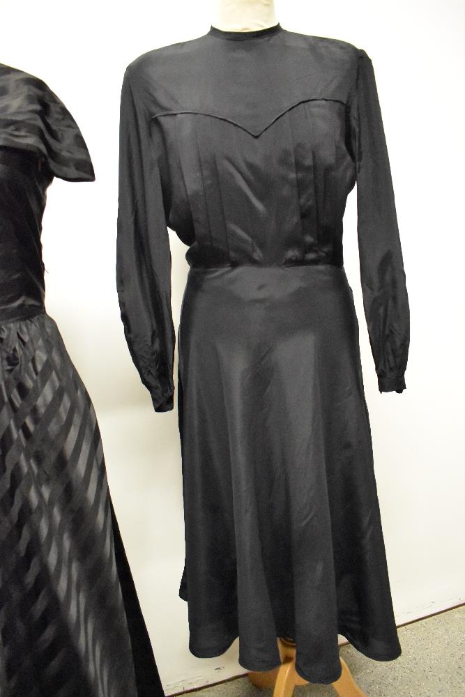 A 1950s evening gown with shawl collar and a 1940s day dress having button decoration to back and - Image 4 of 6