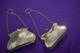 Two early 20th century silver plated coin purses, one having monogrammed initials WN.