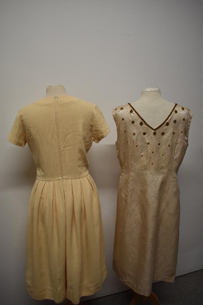 A 1950s buttermilk textured cotton day dress with tie detail to bodice, pleated skirt and cap - Image 6 of 7