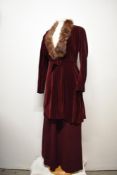 A 1920s/30s two piece outfit, comprising burgundy velvet jacket with belt and fur trim to collar,