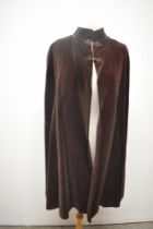 A 1950s 'Hildebrand' chestnut brown velvet cape, fully lined in taffeta.