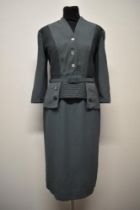 A 1950s teal green day dress, having ribbed detail to bodice and top of skirt, belt to waist and