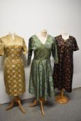 Two vintage 1950s-60s dresses, having oriental prints and another 1960s dress, larger sizes.
