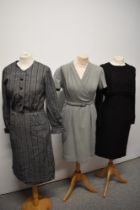 A grey wool 1950s day dress with belt, a 1960s wool blend wiggle dress with metallic gold thread