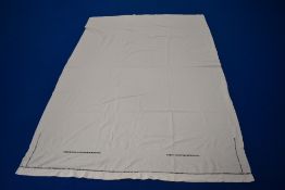 A large antique white linen bed sheet, having embroidery and drawn thread work.