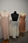 A vintage 1960s St Michaels slip, a 1950s/60s nylon petticoat and a Brettles nightdress.