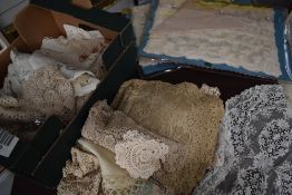 A mass of vintage and antique doyleys, including intricate worked lace and crochet examples.