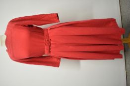 A 1950s German pure wool day dress in raspberry red, with hand stitched detailing to bodice, belt