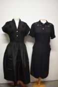 A 1940s navy blue linen day dress, having floral embroidered detail to yolk, Peter Pan collar,