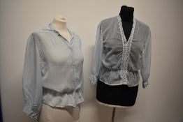 Two 1950s semi sheer striped baby blue blouses.