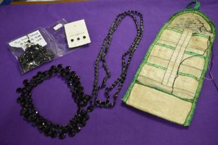 A late 19th/early 20th century needle case and a collection of loose Victorian beads and two