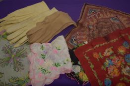 Five vintage fancy handkerchiefs and three pairs of gloves.