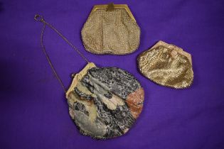 Three 1930s evening bags, including gold Lamé with embossed metal frame.