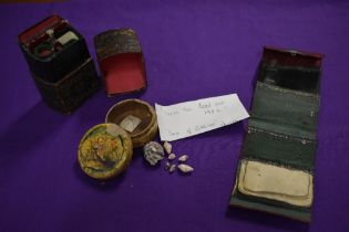 An antique lady's companion, with note pad, pencil and mirror and a similar case with small glass