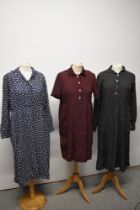 Two 1940s/50s polka dot day dresses and another blue dress with leaf pattern which has signs of