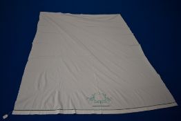 A French bed sheet, having green embroidery and ladder work to top, around a double in size.