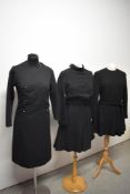 Three vintage 1960s black day dresses.