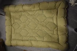 A 1930s/40s green eiderdown, having machine embroidery to centre.