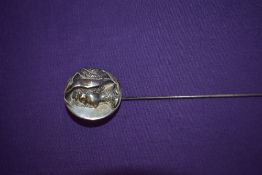 A 1909 dated hallmarked silver (Chester) Arthur Johnson Smith hat pin, depicting Emmeline