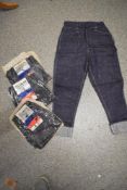Four vintage 1960s pairs of teen/small adult denim jeans with turn ups, new in packaging.