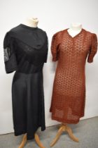 A 1940s/50s black day dress with lace inserts to bodice and sleeves and a russet semi sheer dress,
